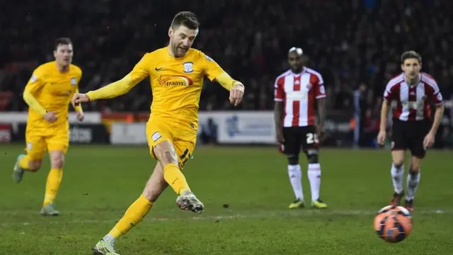 Preston's Paul Gallagher scoring a penalty