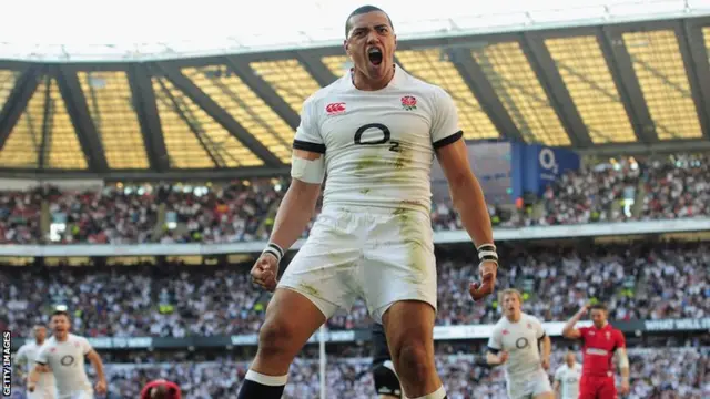 Luther Burrell scores for England against Wales