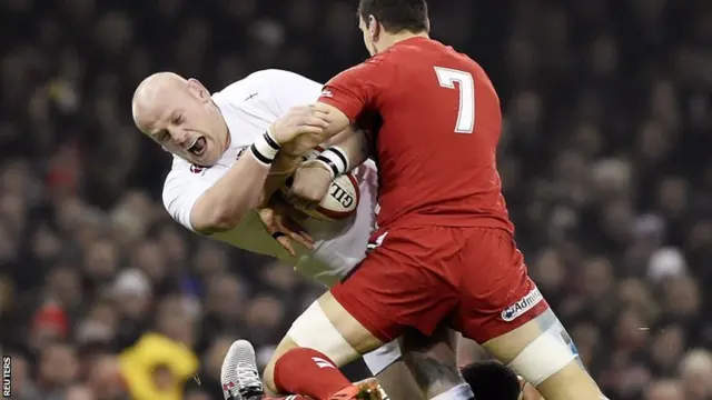 England prop Dan Cole is tackled by Wales captain Sam Warburton