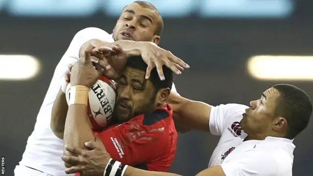 England pair Jonathan Joseph and Luther Burrell compete with Wales number eight Taulupe Faletau