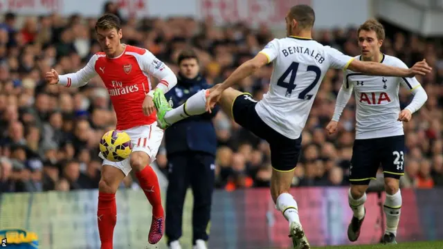 Nabil Bentaleb battles for the balls