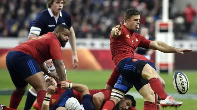 Scrum-half Rory Kockott clears for France