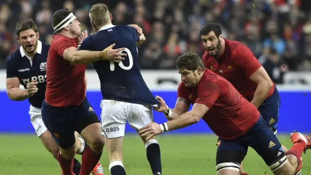 Scotland fly-half Finn Russell is tackled