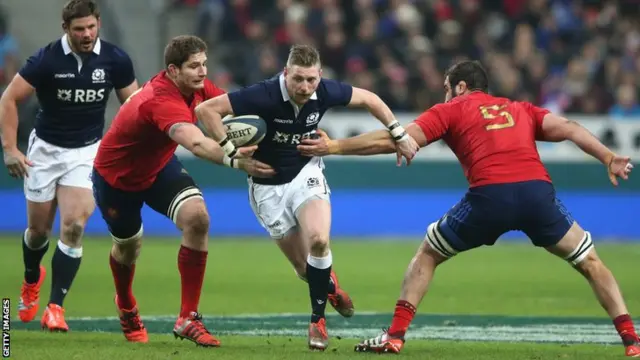 Scotland's Finn Russell attacks