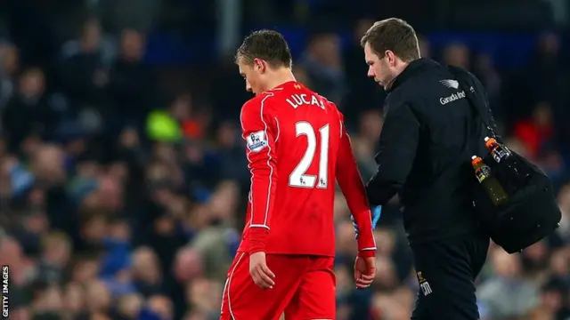 Lucas goes off injured for Liverpool