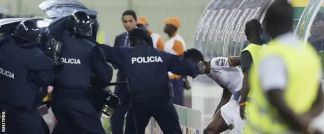 Ghana player and riot police