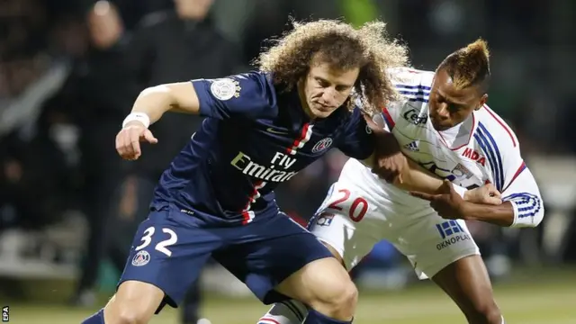 PSG defender David Luiz guards the ball against Lyon