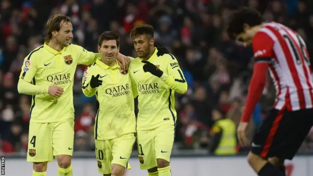 Lionel Messi, Neymar Jr and Ivan Rakitic celebrate