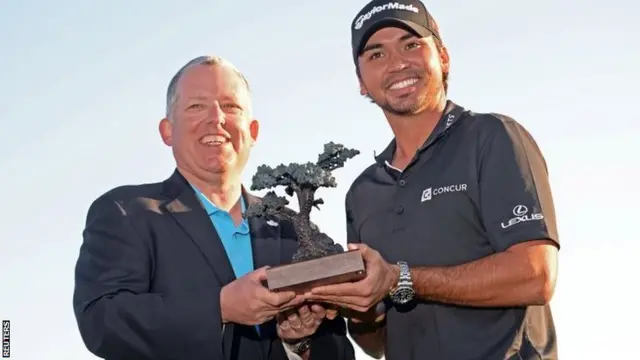 Jason Day with the Farmers Insurance Open trophy