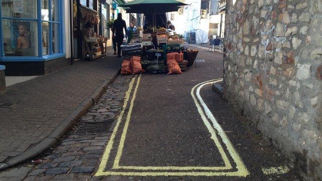 Double yellow lines across the end of a narrow road in Clifton