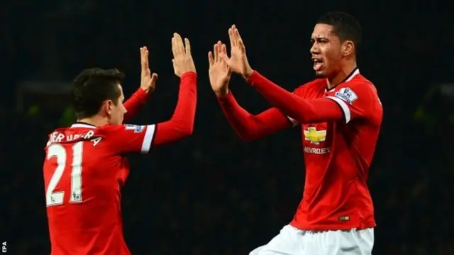 Chris Smalling and Ander Herrera celebrate