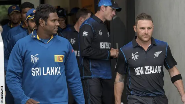 Captains Angelo Mathews and Brendon McCullum lead the teams out