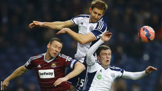 Craig Dawson goes up for the ball against West Ham