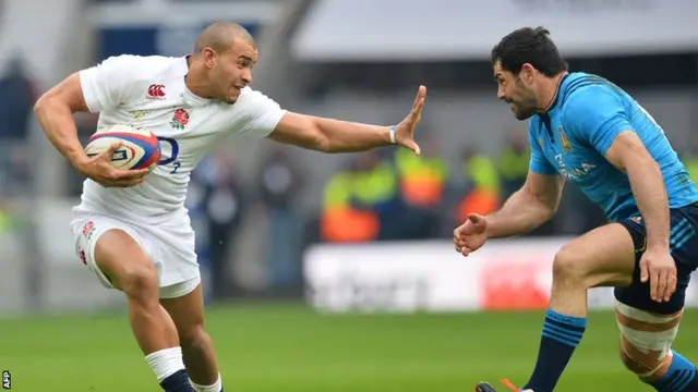 England's Jonathan Joseph takes on Italy