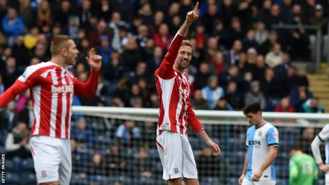 Peter Crouch celebrates Stoke's first goal