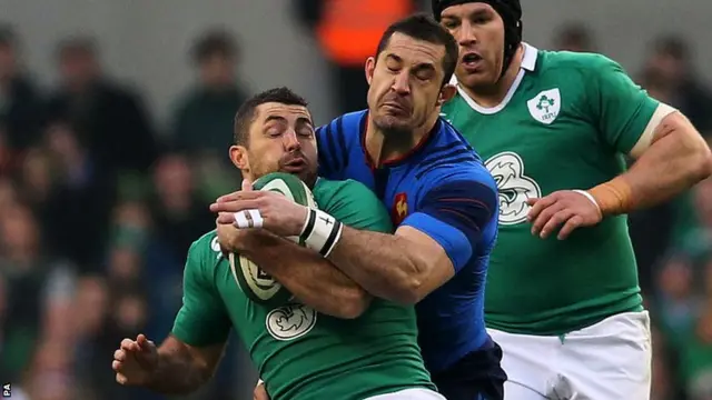 Rob Kearney is tackled