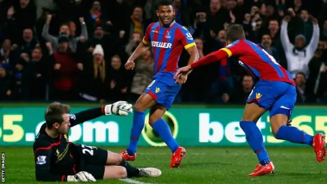 Dwight Gayle celebrates