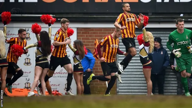 Bradford City players make their way out for the second half