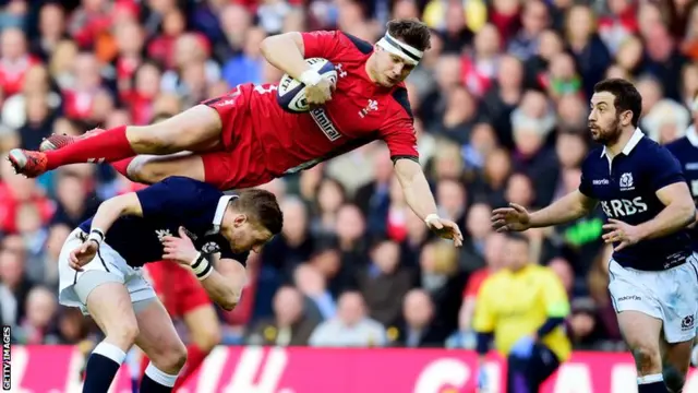 Dan Biggar is upended by Finn Russell