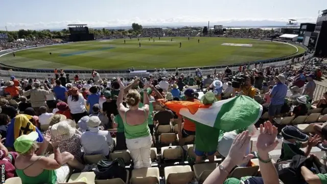 Fans enjoy the match