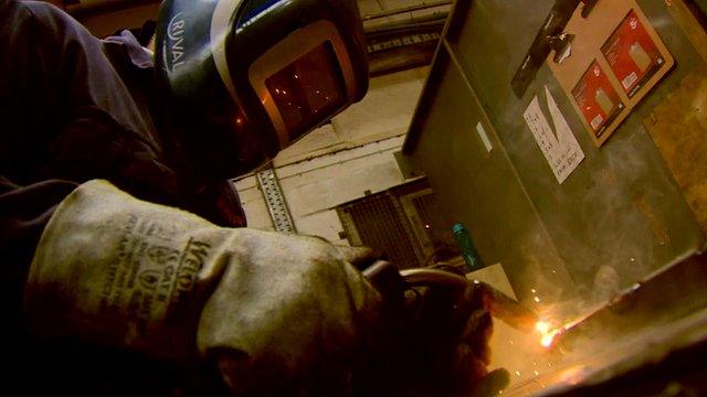 Worker using blow-torch