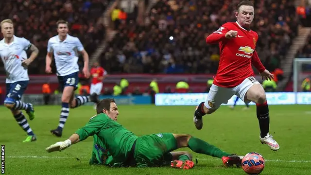 Wayne Rooney goes down for a penalty