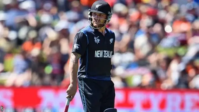 New Zealand batsman Brendon McCullum walks off