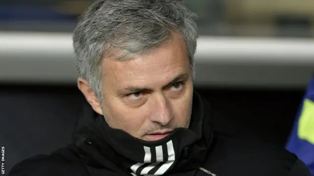 Jose Mourinho looks on