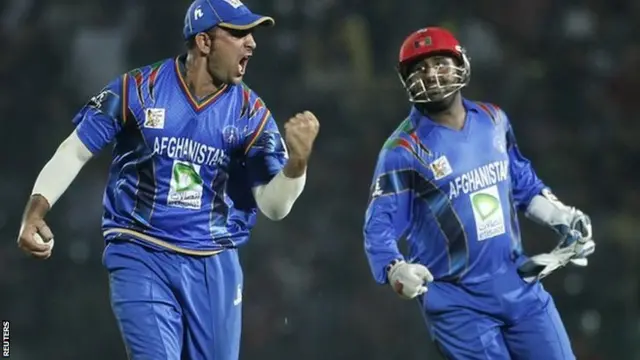 Samiullah Shenwari and Mohammad Shahzad celebrate Afghanistan's win