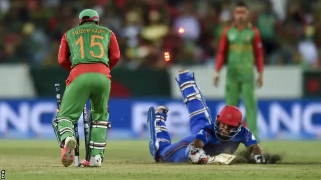 Mushfiqur Rahim completes a run out