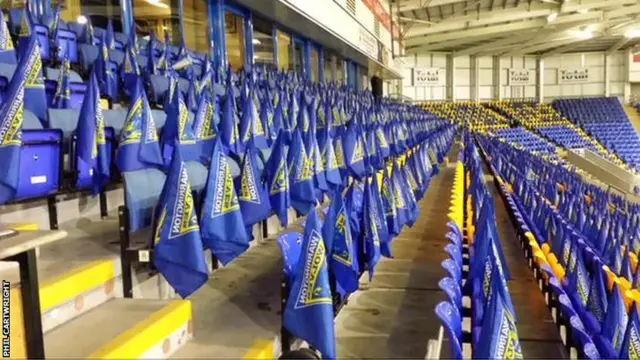 Flags on the seat for Warrington fans at the Halliwell Jones Stadium