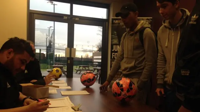 People at the People's Cup sign up desk in Romford