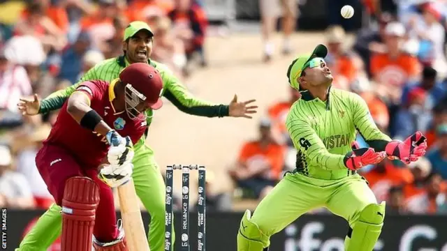 Umar Akmal of Pakistan appeals for the wicket of Darren Bravo