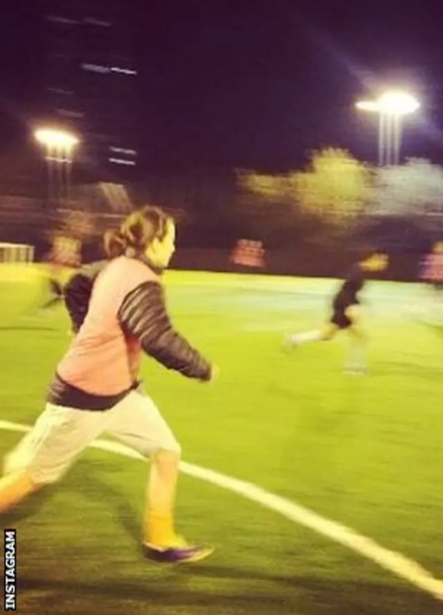 action shot of women playing football