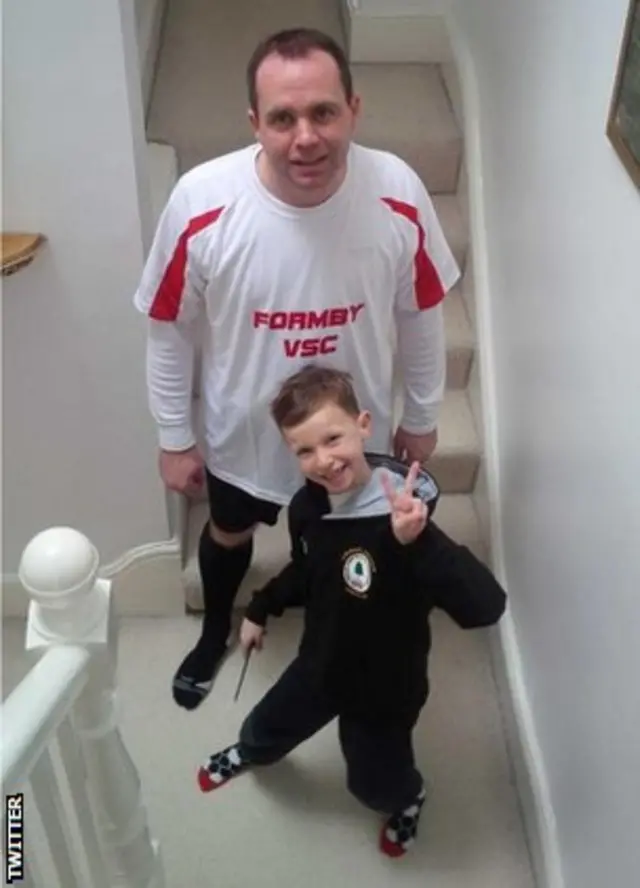 People's Cup man with his son in football kit