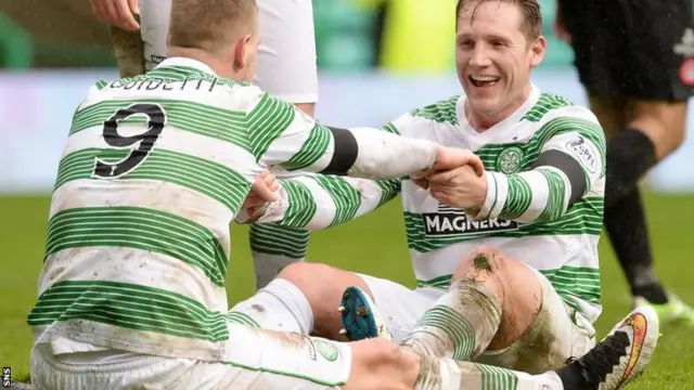 John Guidetti and Kris Commons celebrate