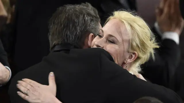 Patricia Arquette hugs her co-star Ethan Hawke