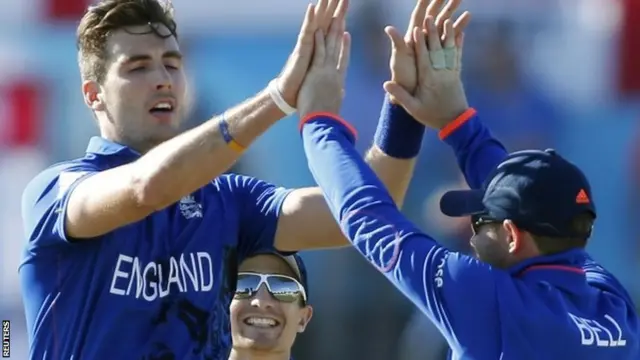 Steven Finn celebrates