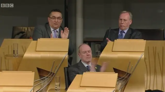 MSPs clapping