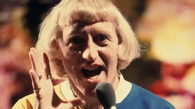 Jimmy Savile on Top of the Pops in 1975