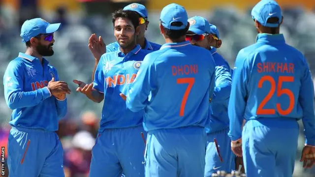 India celebrate a wicket