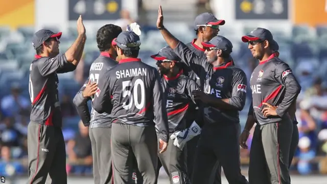 UAE celebrate taking the wicket of Shikhar Dhawan