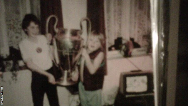 Two children with the European Cup trophy