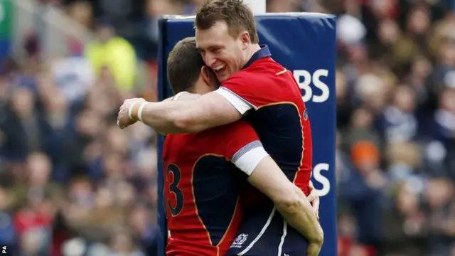 Mark Bennett celebrates