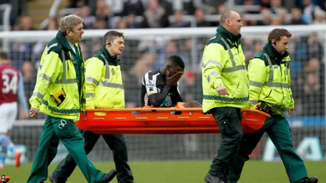 Massadio Haidara leaves the pitch on a stretcher