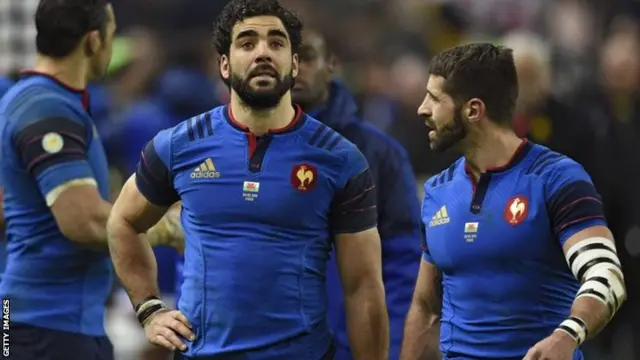 French players look dejected