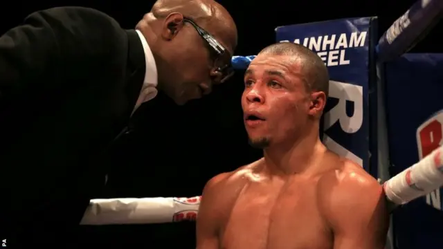 Chris Eubank Jnr is given advice by his father