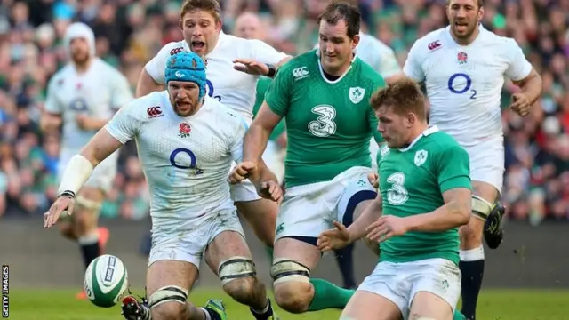 James Haskell of England drops on the loose ball ahead of Devin Toner of Ireland