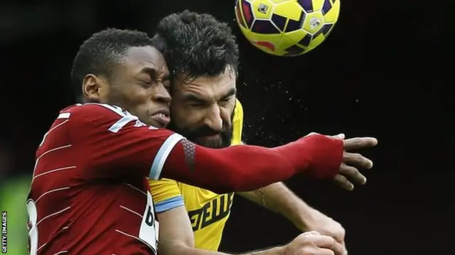 Crystal Palace's Mile Jedinak (right) and West Ham's Diafro Sakho