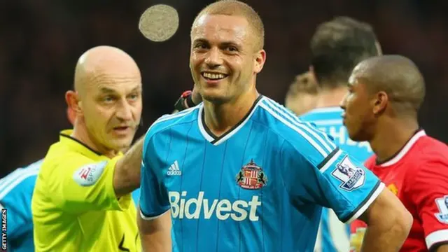 Sunderland defender Wes Brown (right) shows his dismay at being sent off by referee Roger East